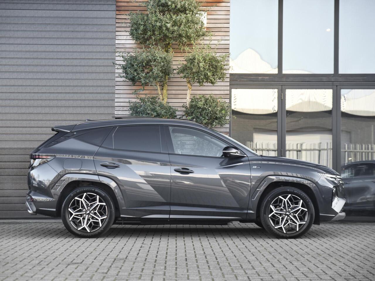 Hyundai TUCSON 1.6 T-GDI Plug-in Hybrid 4WD N line Sky Panoramadak, adaptieve cruise control, Alcantara bekleding Navi, Camara 360.