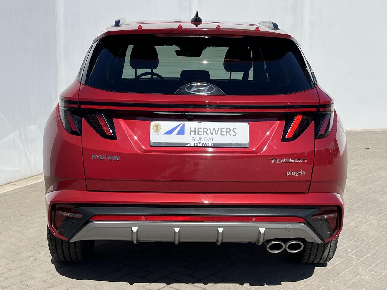 Hyundai TUCSON 1.6 T-GDI PHEV N Line Ed. 4WD Automaat / Dealer Onderhouden / Achteruitrij Camera / Stuur- en Stoelverwarming / Apple Carplay & Android Auto / Keyless Entry & Start / Navigatie full map / Adaptieve cruise control / Elektrische achterklep / Ski-luik / Kre