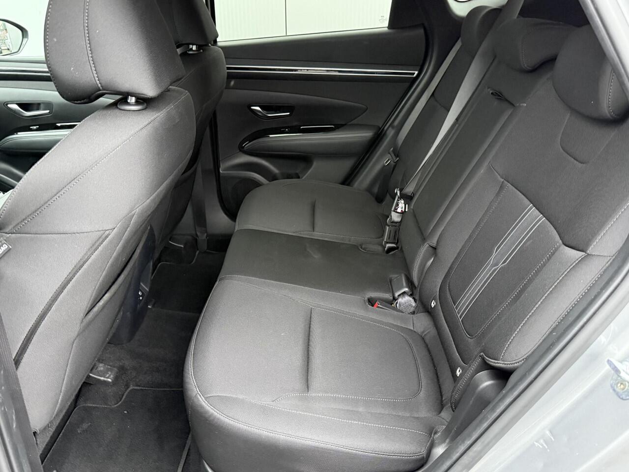 Hyundai TUCSON 1.6 T-GDI HEV Comfort Smart / Navigatie / Adaptieve Cruise Control / Fabrieksgarantie t/m 10-2027 / Elektrisch bedienbare achterklep /