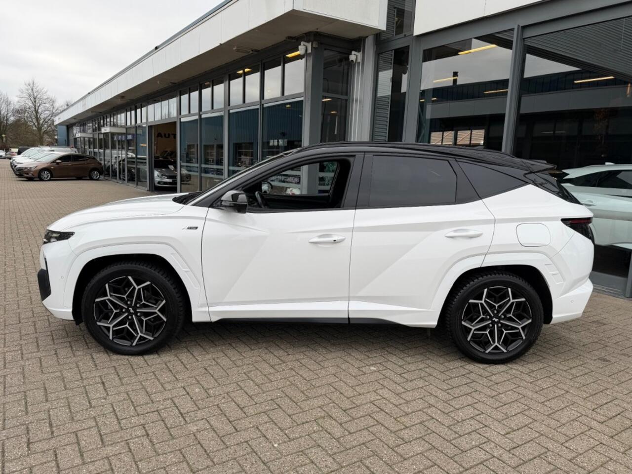 Hyundai TUCSON 1.6 T-GDI N LINE 4WD PHEV AUTOMAAT NAVI PDC-CAMERA WINTERPACK.