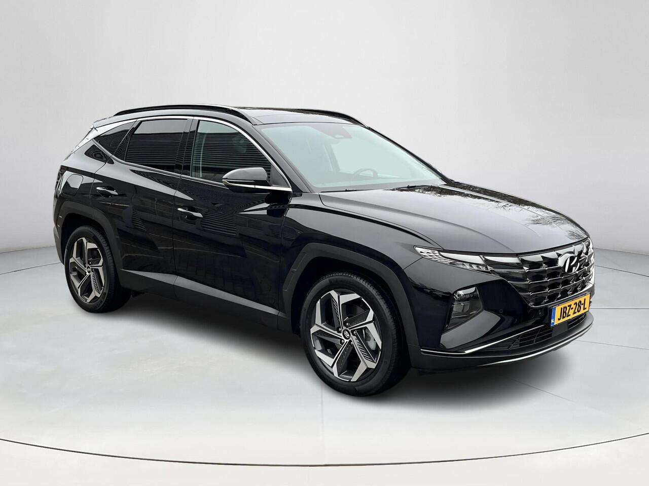 Hyundai TUCSON 1.6 T-GDI PHEV Comfort 4WD | 3 jaar garantie | Rijklaarprijs dus geen extra afleverkosten! | Automaat | Panoramadak | Apple/android auto