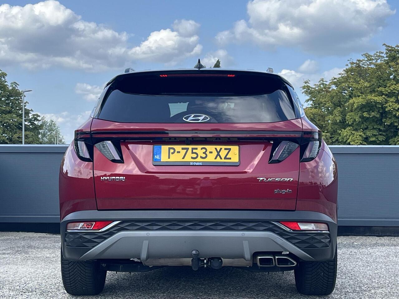 Hyundai TUCSON Premium 1.6 T-GDI 265pk PHEV 4WD | TREKHAAK | LEDER | DAKKLEUR ZWART | ALLSEASON BANDEN | 360° CAMERA |