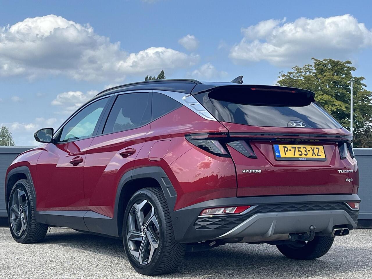 Hyundai TUCSON Premium 1.6 T-GDI 265pk PHEV 4WD | TREKHAAK | LEDER | DAKKLEUR ZWART | ALLSEASON BANDEN | 360° CAMERA |