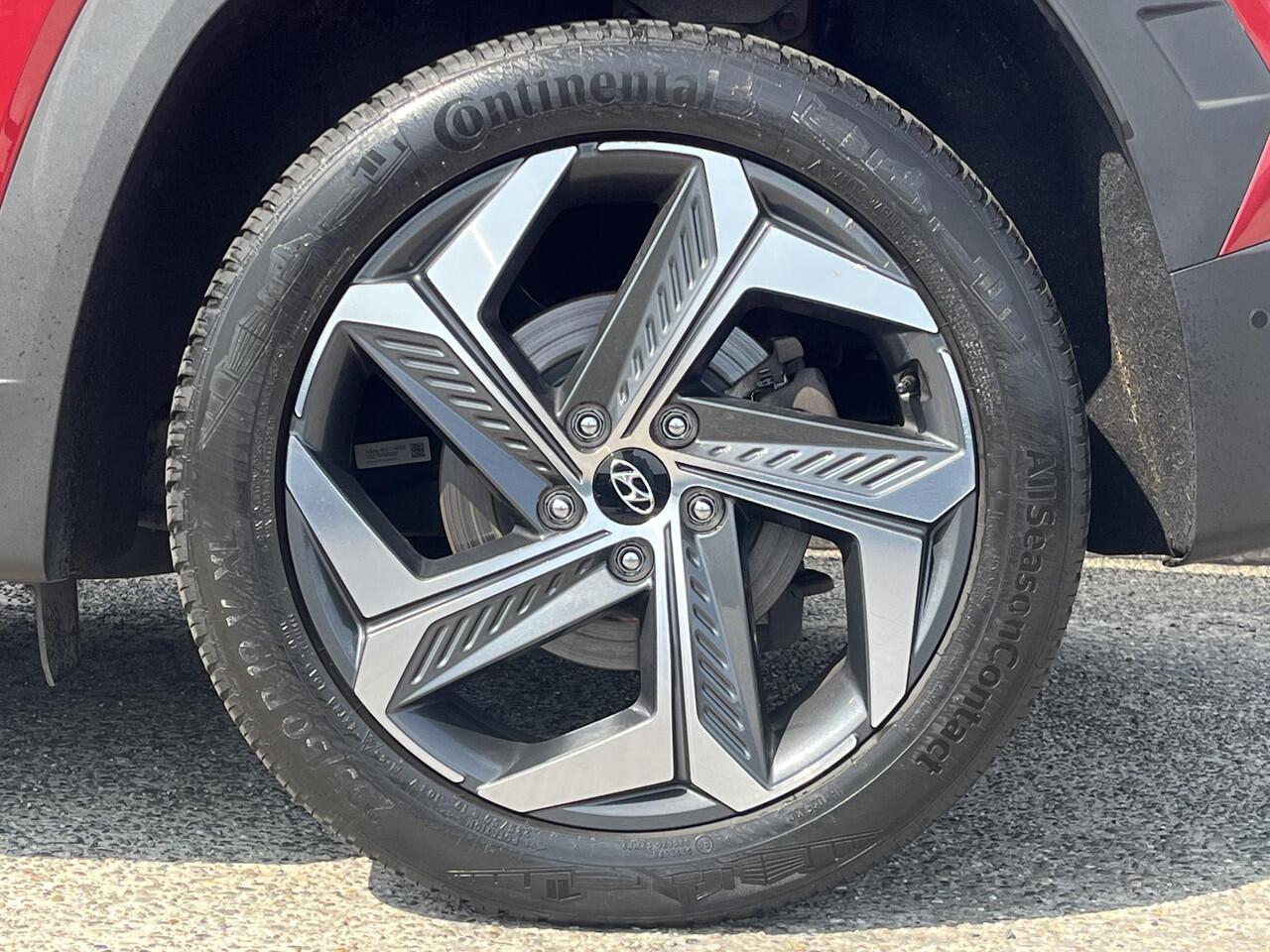 Hyundai TUCSON Premium 1.6 T-GDI 265pk PHEV 4WD | TREKHAAK | LEDER | DAKKLEUR ZWART | ALLSEASON BANDEN | 360° CAMERA |