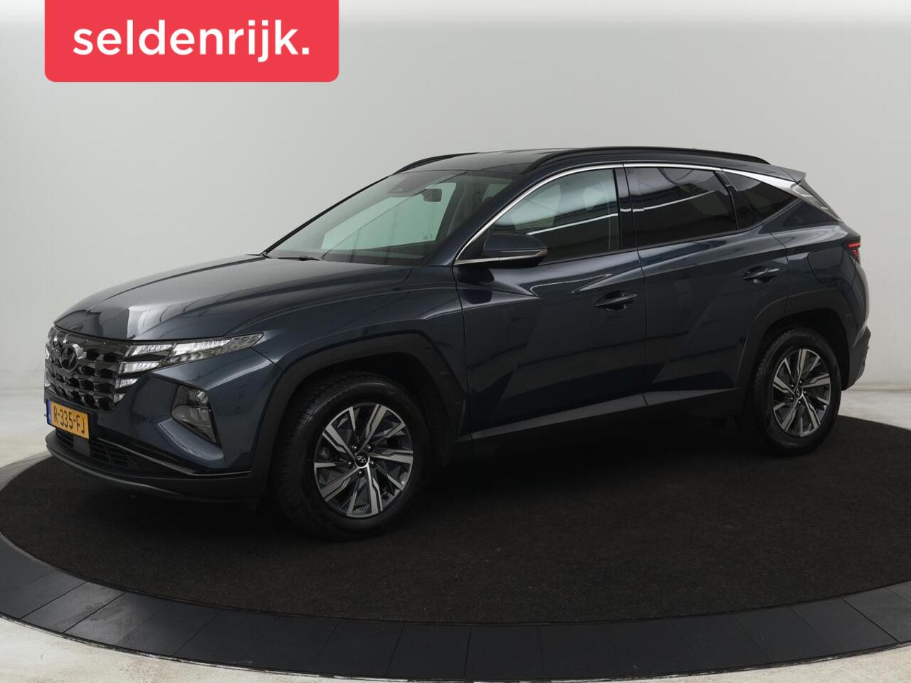 Hyundai TUCSON 1.6 T-GDI HEV Comfort Smart | Trekhaak | Stoel & stuurverwarming | Adaptive cruise | Carplay | Camera | Navigatie | Keyless