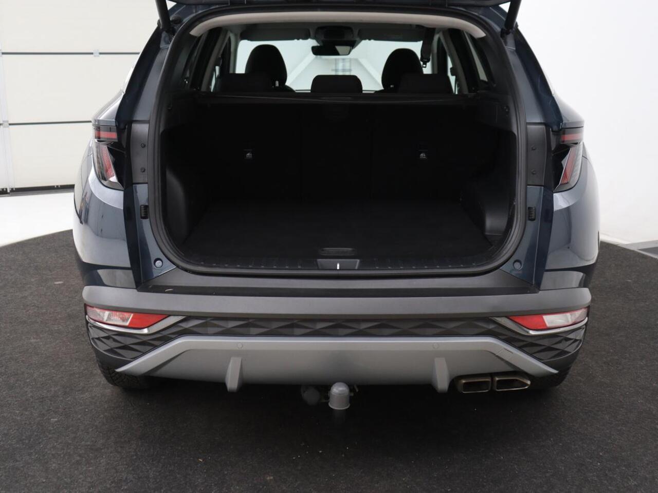 Hyundai TUCSON 1.6 T-GDI HEV Comfort Smart | Trekhaak | Stoel & stuurverwarming | Adaptive cruise | Carplay | Camera | Navigatie | Keyless