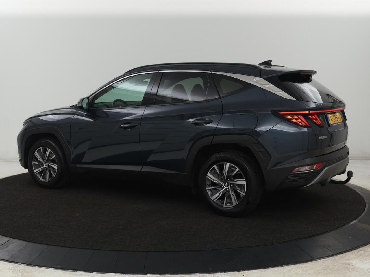 Hyundai TUCSON 1.6 T-GDI HEV Comfort Smart | Trekhaak | Stoel & stuurverwarming | Adaptive cruise | Carplay | Camera | Navigatie | Keyless