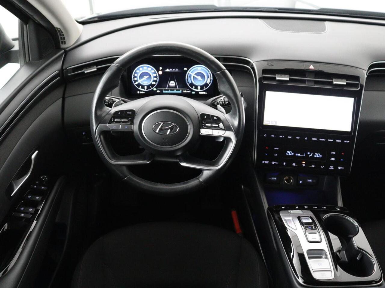 Hyundai TUCSON 1.6 T-GDI HEV Comfort Smart | Trekhaak | Stoel & stuurverwarming | Adaptive cruise | Carplay | Camera | Navigatie | Keyless