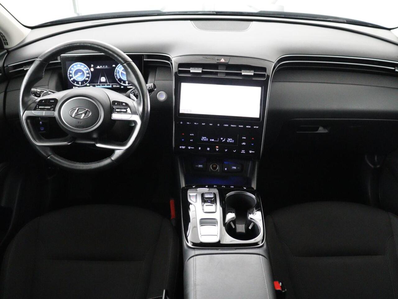 Hyundai TUCSON 1.6 T-GDI HEV Comfort Smart | Trekhaak | Stoel & stuurverwarming | Adaptive cruise | Carplay | Camera | Navigatie | Keyless