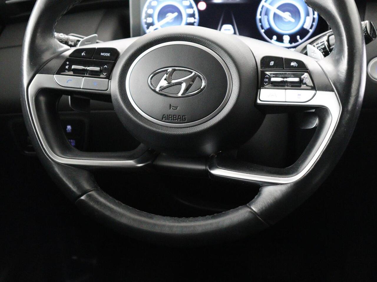 Hyundai TUCSON 1.6 T-GDI HEV Comfort Smart | Trekhaak | Stoel & stuurverwarming | Adaptive cruise | Carplay | Camera | Navigatie | Keyless