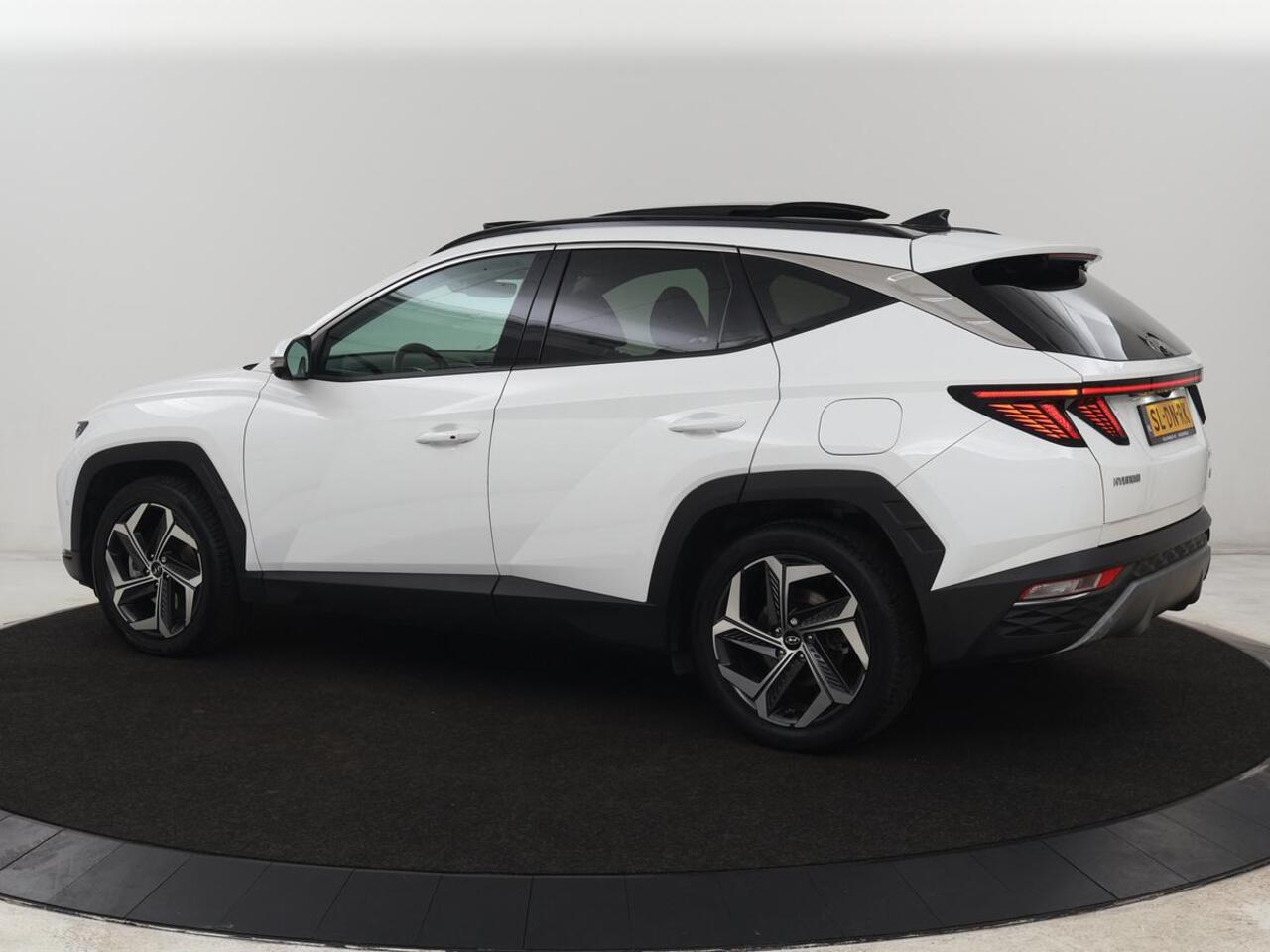 Hyundai TUCSON 1.6 T-GDI PHEV Premium Sky 4WD | Panoramadak | Stoelventilatie | 360 Camera | Leder | Krell Audio | Adaptive cruise | Achterbankverwarming | Full LED | Keyless | Carplay | Navigatie | Plug In