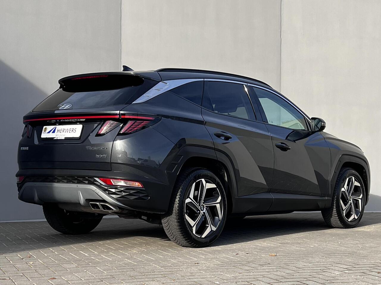 Hyundai TUCSON 1.6 T-GDI HEV Comfort Smart Automaat / Fabrieksgarantie tot 02-2028 ** / Dealer onderhouden / Navigatie / Achteruitrijcamera / Stuur- en stoelverwarming / Apple Carplay Android / 19" LM + All Season banden /