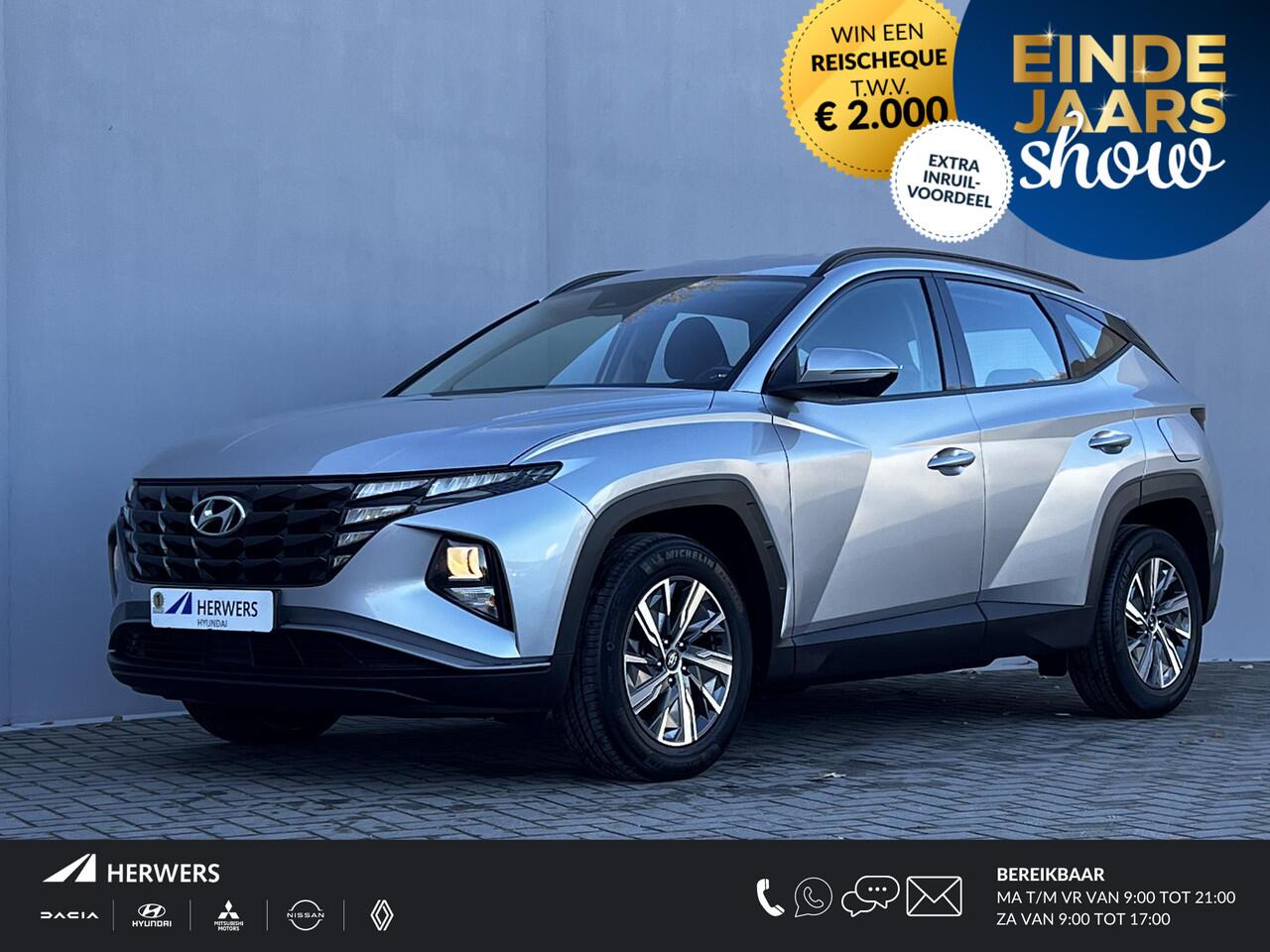 Hyundai TUCSON 1.6 T-GDI HEV 230pk Comfort / Fabrieksgarantie tot 02-2028 / Dealer onderhouden / 1.650kg trekgewicht / Navigatie / Achteruitrijcamera / Apple Carplay Android / 17" LM wielen /