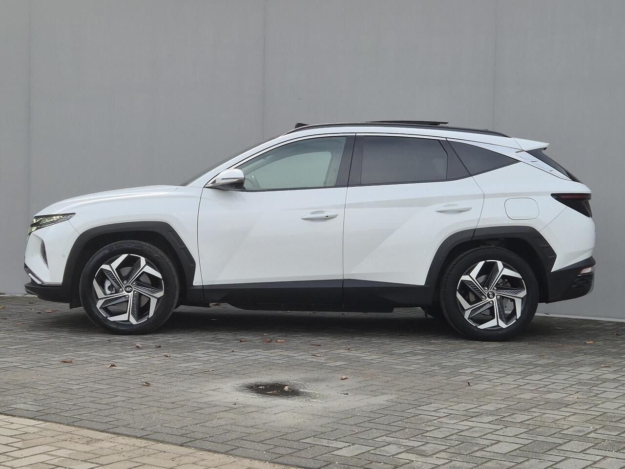 Hyundai TUCSON 1.6 T-GDI PHEV Plug-in Premium Sky 4WD Automaat / elektrisch glazen panorama-dak / Trekgewicht 1350 kg / Stuur-, Stoel en Achterbank verwarming / Elektrische achterklep / Adaptief CC / Rondomzicht camera /