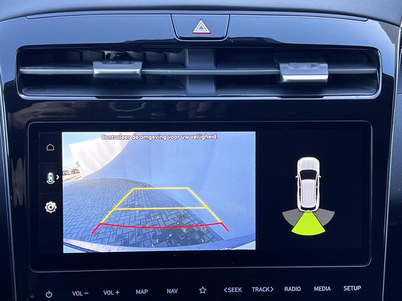 Hyundai TUCSON 1.6 T-GDI HEV 230pk Comfort / Fabrieksgarantie tot 02-2028 / Dealer onderhouden / 1.650kg trekgewicht / Navigatie / Achteruitrijcamera / Apple Carplay Android / 17" LM wielen /