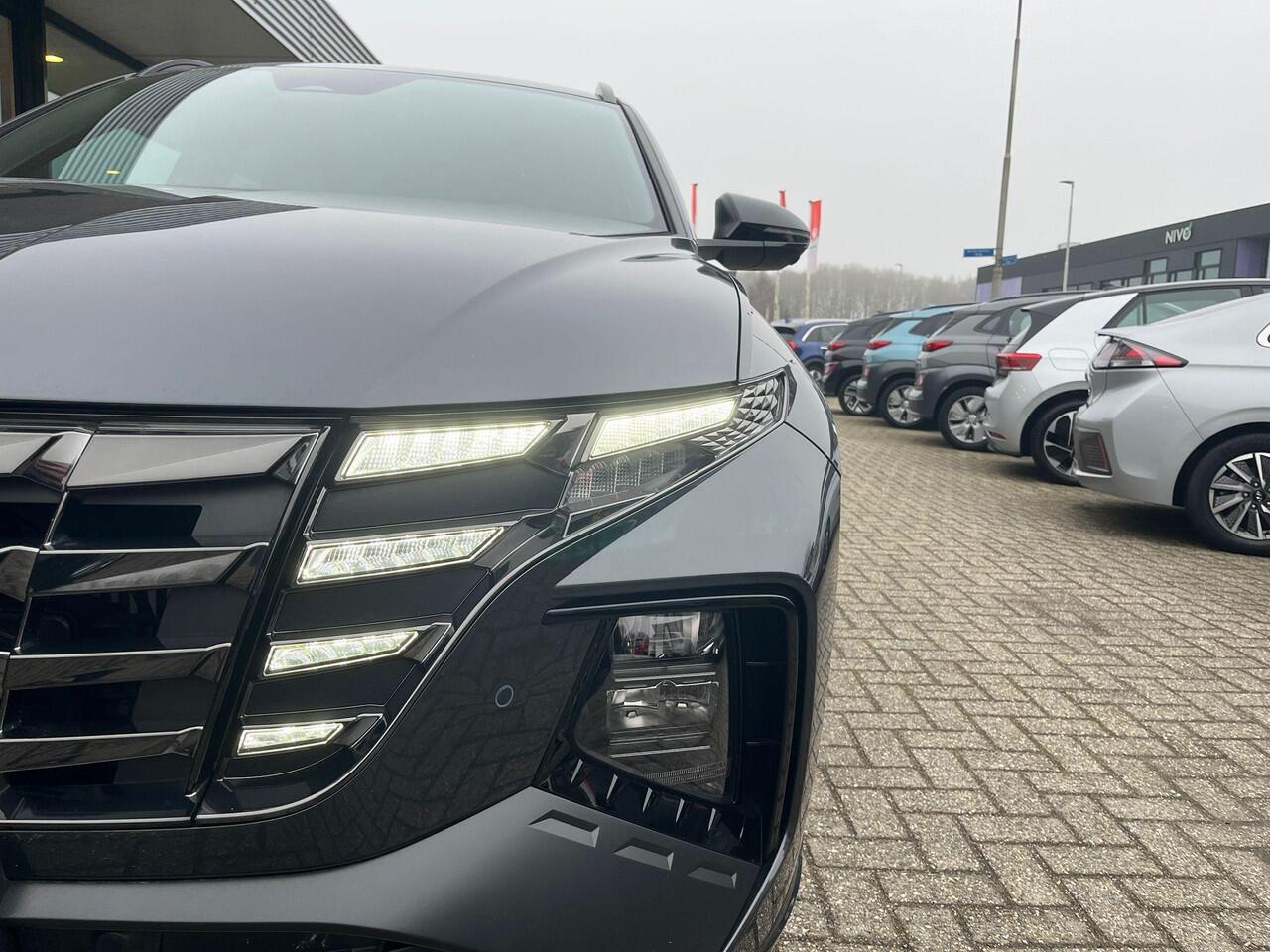 Hyundai TUCSON 1.6 T-GDI PHEV N Line 4WD | Stoelverwarming | Elektrisch verstelbare stoelen met geheugen | Achteruitrijcamera | Adaptive cruise control