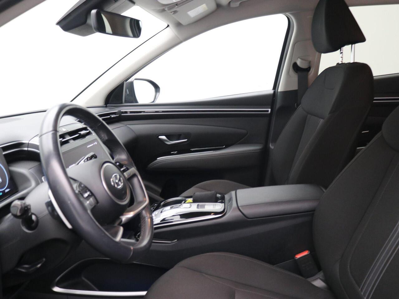 Hyundai TUCSON 1.6 T-GDI HEV Comfort AUTOMAAT / Navigatie / NL Auto / Apple CarPlay & Android Auto / 1650KG Trekgewicht / Achteruitrijcamera / 1ste Eigenaar / Climate control / Adaptieve Cruise control / Stoelverwarming / Dealeronderhouden /