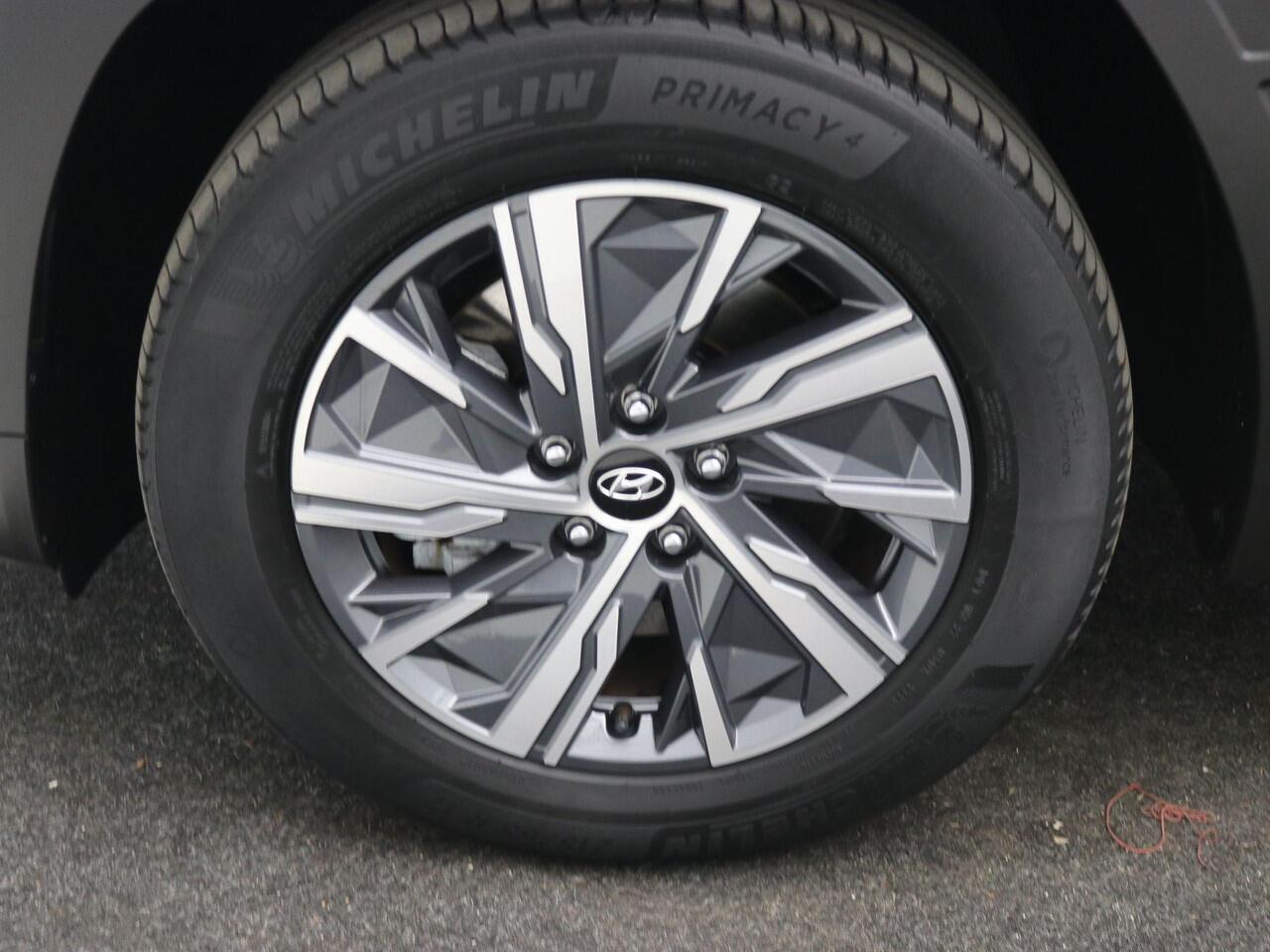 Hyundai TUCSON 1.6 T-GDI HEV Comfort AUTOMAAT / Navigatie / NL Auto / Apple CarPlay & Android Auto / 1650KG Trekgewicht / Achteruitrijcamera / 1ste Eigenaar / Climate control / Adaptieve Cruise control / Stoelverwarming / Dealeronderhouden /