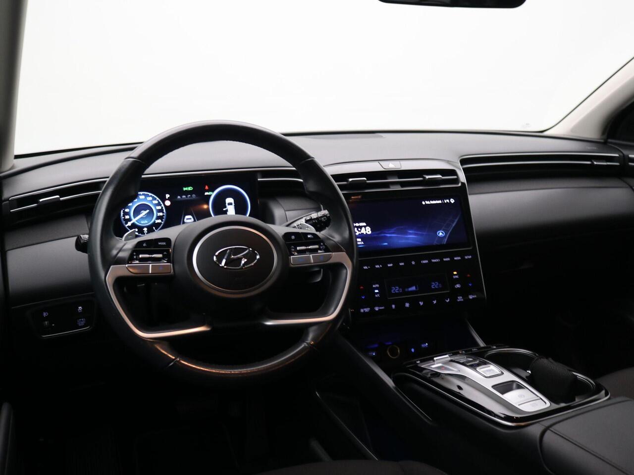 Hyundai TUCSON 1.6 T-GDI HEV Comfort AUTOMAAT / Navigatie / NL Auto / Apple CarPlay & Android Auto / 1650KG Trekgewicht / Achteruitrijcamera / 1ste Eigenaar / Climate control / Adaptieve Cruise control / Stoelverwarming / Dealeronderhouden /