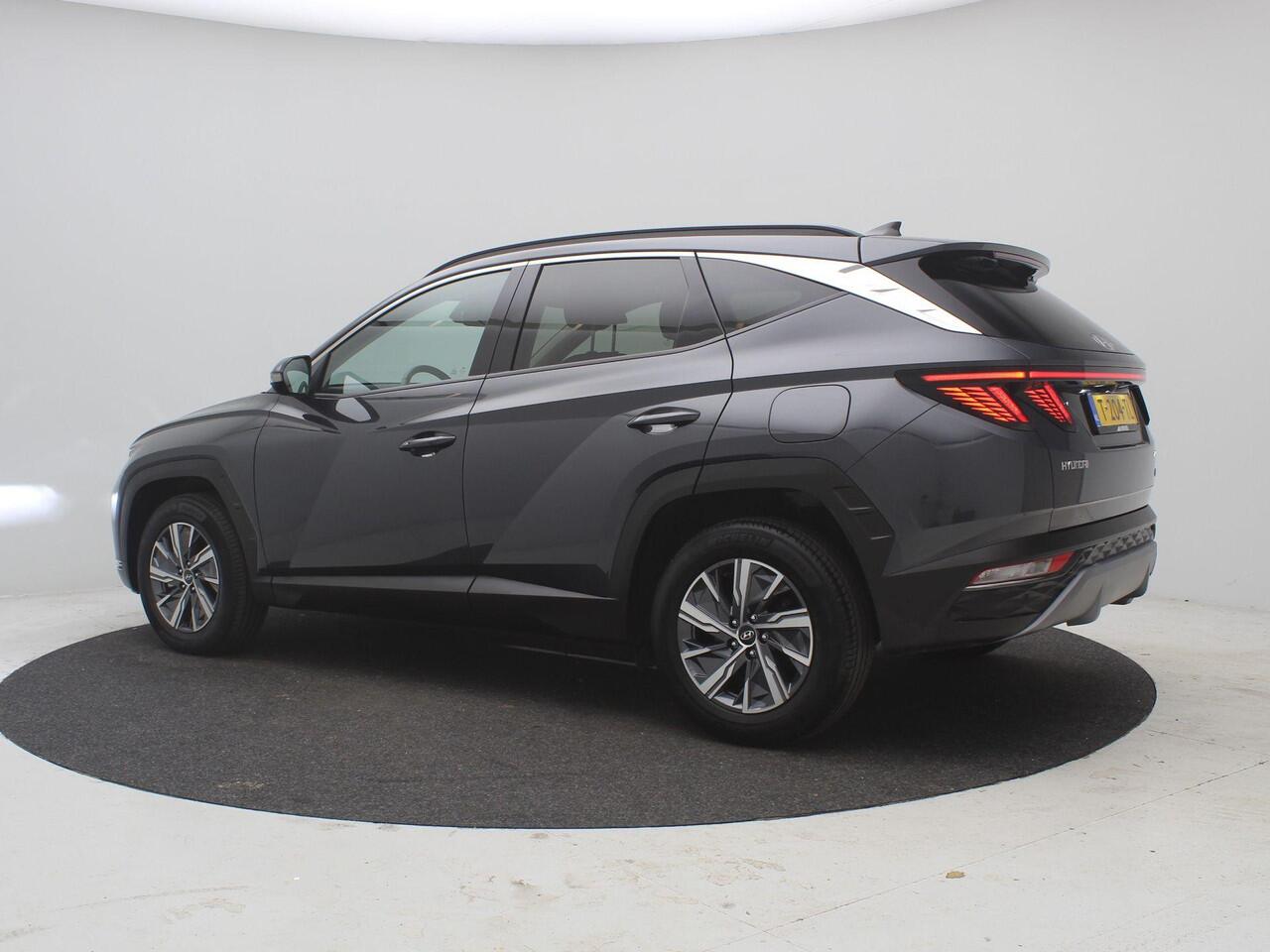 Hyundai TUCSON 1.6 T-GDI HEV Comfort AUTOMAAT / Navigatie / NL Auto / Apple CarPlay & Android Auto / 1650KG Trekgewicht / Achteruitrijcamera / 1ste Eigenaar / Climate control / Adaptieve Cruise control / Stoelverwarming / Dealeronderhouden /