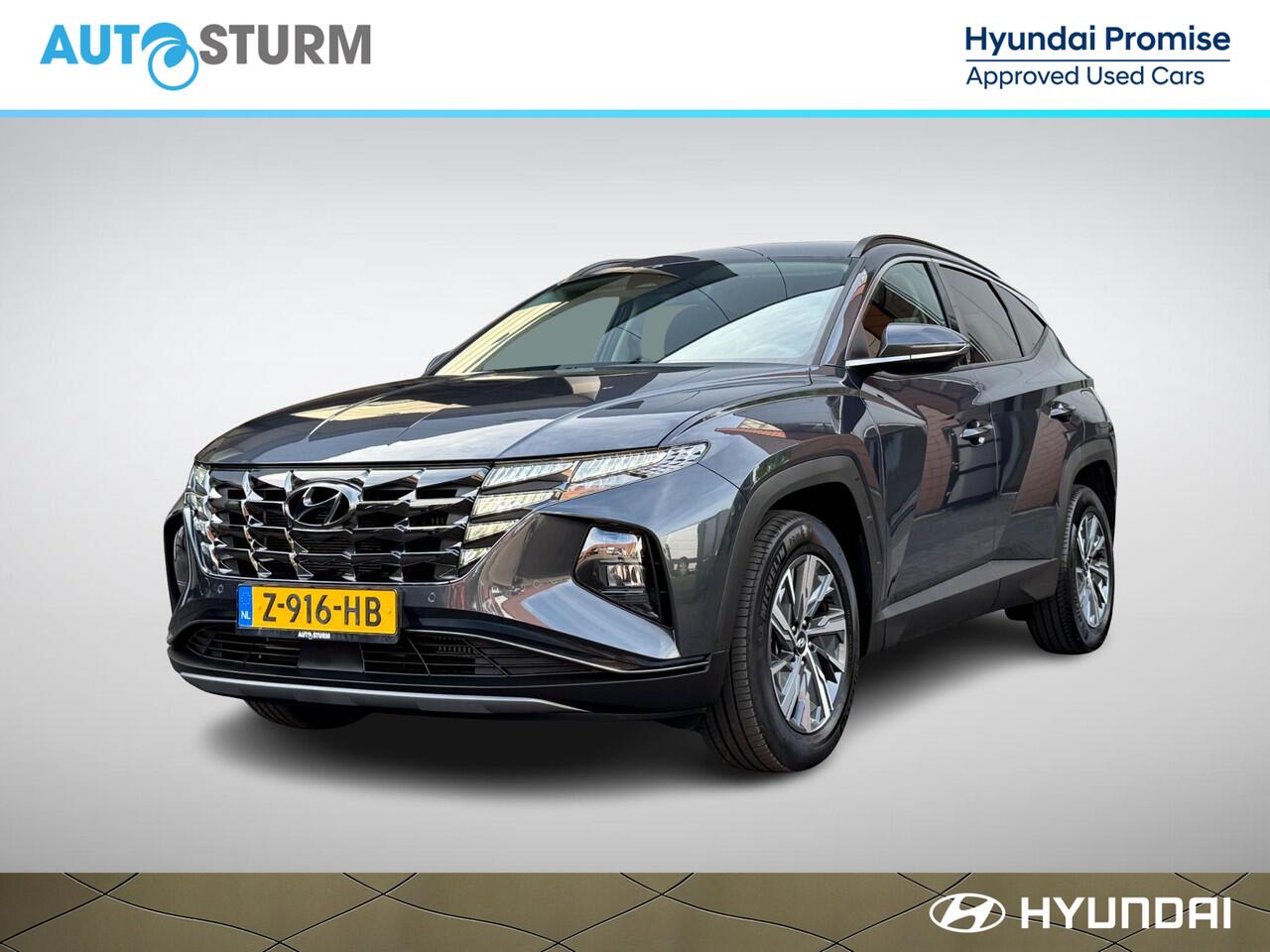 Hyundai TUCSON 1.6 T-GDI HEV Comfort Smart NL-Auto, 1650kg Trekgewicht! | Navigatie | Camera | Apple Carplay/Android Auto | Stuur- + Stoelverwarming | Elek. Achterklep | Rijklaarprijs!