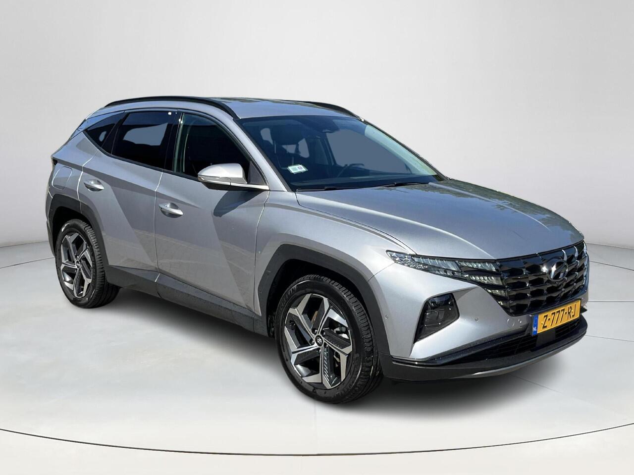 Hyundai TUCSON 1.6 T-GDI PHEV Premium 4WD | Rijklaarprijs dus GEEN afleverkosten! | 360 graden camera| Leder | Verwarmde en gekoelde stoelen |