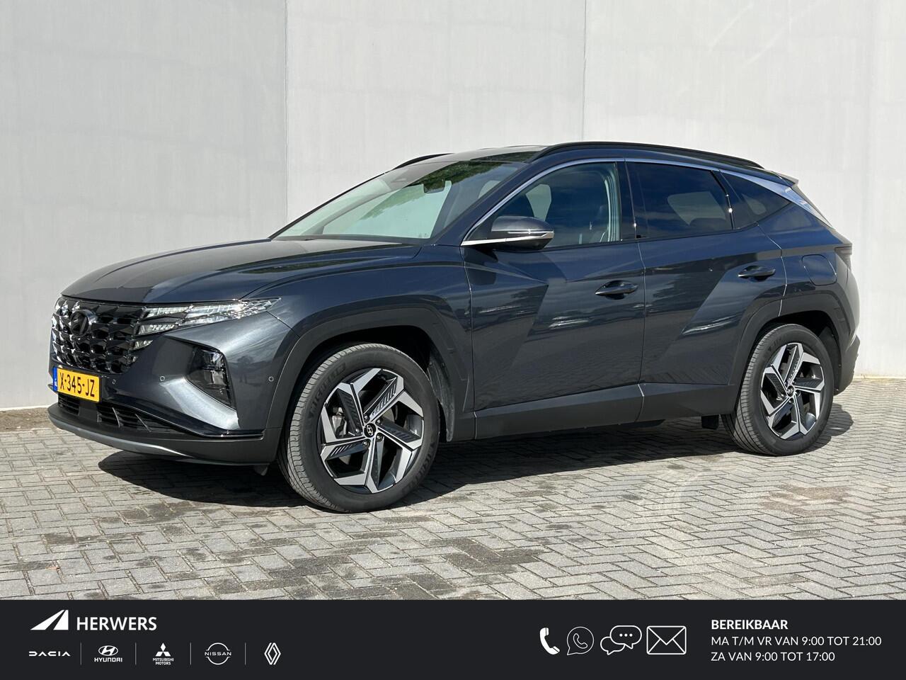 Hyundai TUCSON 1.6 T-GDI PHEV Premium 4WD / Trekhaak ( 1.350 KG ) / Lederen bekleding / Elektrische kofferbak / Elektrisch verstelbare stoelen / Stoelverwarming / Stoelverkoeling