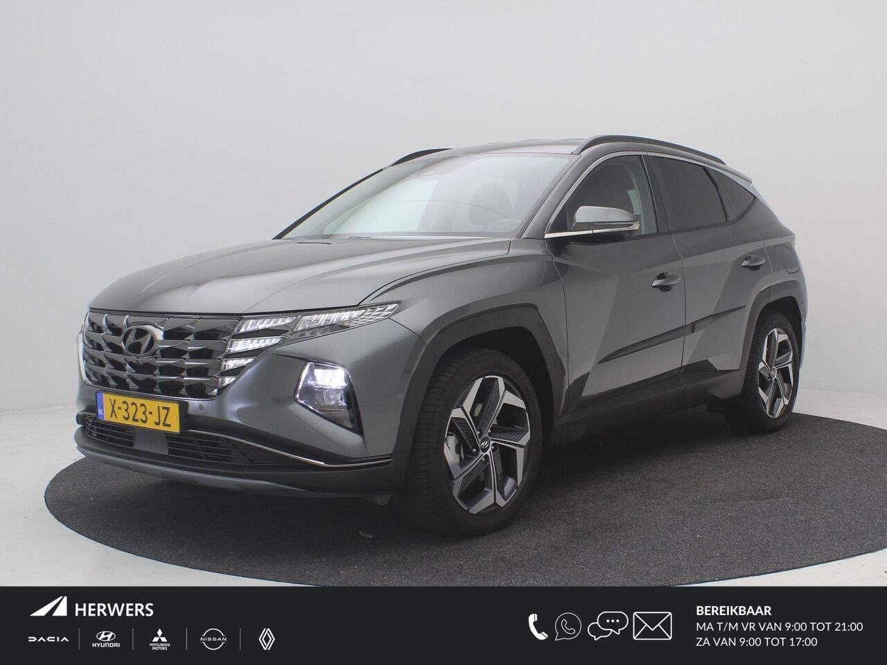 Hyundai TUCSON 1.6 T-GDI PHEV Premium 4WD AUTOMAAT /Trekhaak / 1ste Eigenaar / NL auto / Dealer onderhouden / Navigatie / Lederen bekleding / Stoelverwarming Voor & Achter / Adaptieve Cruise Control /