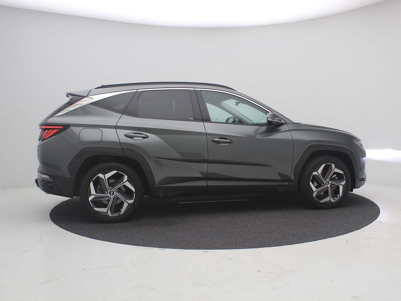 Hyundai TUCSON 1.6 T-GDI PHEV Premium 4WD AUTOMAAT /Trekhaak / 1ste Eigenaar / NL auto / Dealer onderhouden / Navigatie / Lederen bekleding / Stoelverwarming Voor & Achter / Adaptieve Cruise Control /
