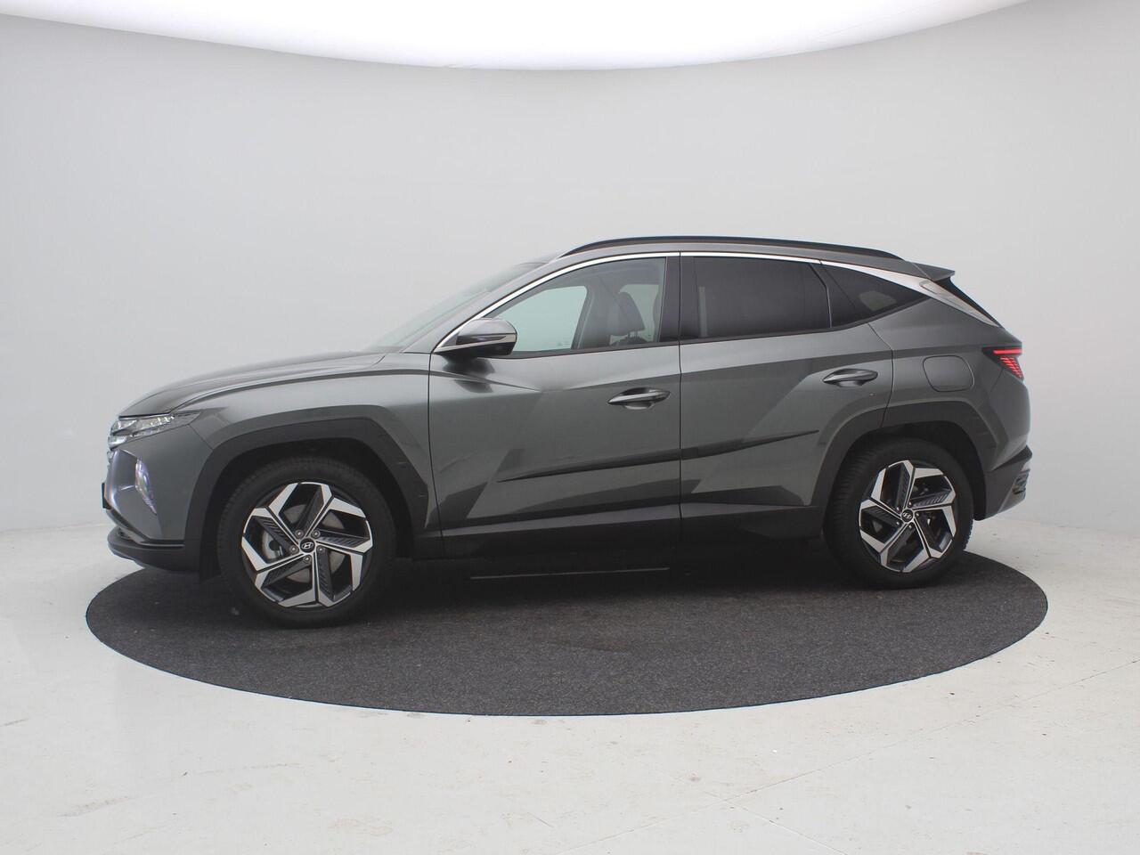 Hyundai TUCSON 1.6 T-GDI PHEV Premium 4WD AUTOMAAT /Trekhaak / 1ste Eigenaar / NL auto / Dealer onderhouden / Navigatie / Lederen bekleding / Stoelverwarming Voor & Achter / Adaptieve Cruise Control /