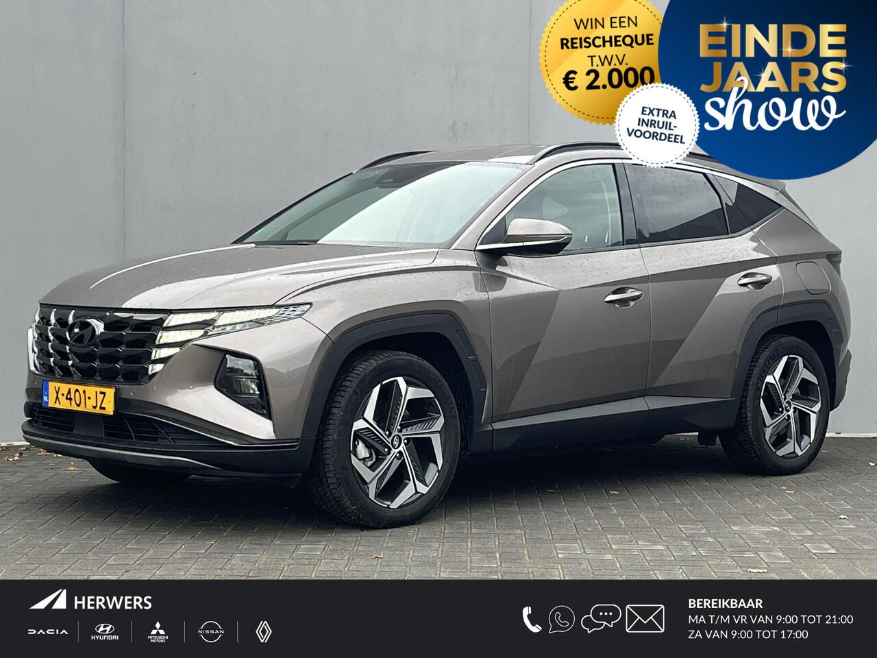 Hyundai TUCSON 1.6 T-GDI PHEV Comfort Smart 4WD / Vaste Trekhaak 13-polig (Trekgewicht 1.350kg) / Achteruitrijcamera / Stuur- en Stoelverwarming / Climate Control / Adaptieve Cruise Control / Apple Carplay & Android Auto / Keyless Entry & Start / Navigatie full map / E