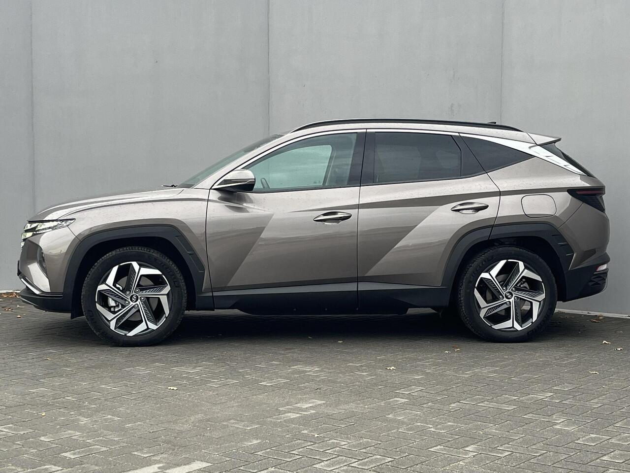 Hyundai TUCSON 1.6 T-GDI PHEV Comfort Smart 4WD / Vaste Trekhaak 13-polig (Trekgewicht 1.350kg) / Achteruitrijcamera / Stuur- en Stoelverwarming / Climate Control / Adaptieve Cruise Control / Apple Carplay & Android Auto / Keyless Entry & Start / Navigatie full map / E