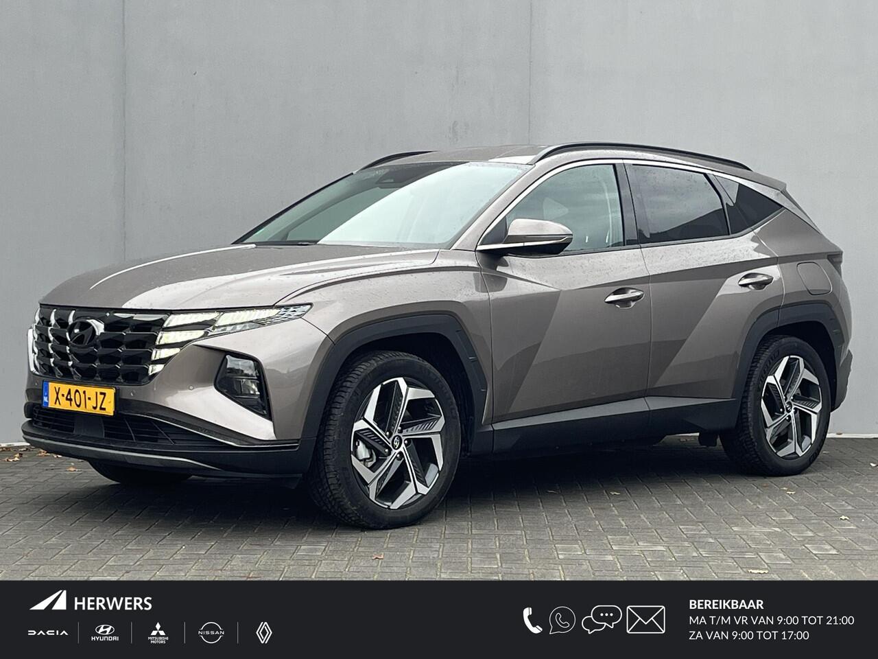 Hyundai TUCSON 1.6 T-GDI PHEV Comfort Smart 4WD / Vaste Trekhaak 13-polig (Trekgewicht 1.350kg) / Achteruitrijcamera / Stuur- en Stoelverwarming / Climate Control / Adaptieve Cruise Control / Apple Carplay & Android Auto / Keyless Entry & Start / Navigatie full map / E