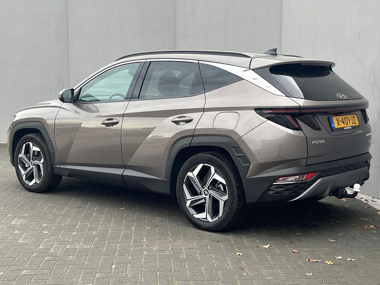 Hyundai TUCSON 1.6 T-GDI PHEV Comfort Smart 4WD / Vaste Trekhaak 13-polig (Trekgewicht 1.350kg) / Achteruitrijcamera / Stuur- en Stoelverwarming / Climate Control / Adaptieve Cruise Control / Apple Carplay & Android Auto / Keyless Entry & Start / Navigatie full map / E