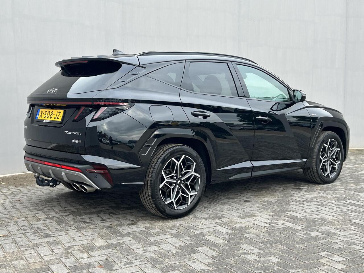 Hyundai TUCSON 1.6 T-GDI PHEV N Line 4WD / Trekhaak 1.350 Trekgewicht / Elektrische Achterklep / Elektrisch Verstelbare Stoelen / Stuur & Stoelverwarming / Stoelverkoeling / Adaptieve Cruise Control / Navigatie / Climate Control / Lichtmetalen Velgen /