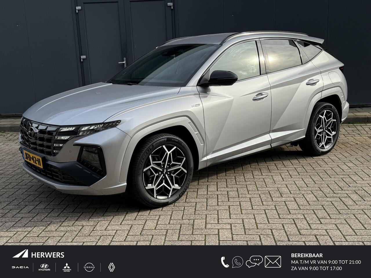 Hyundai TUCSON 1.6 T-GDI HEV 230pk N Line Edition / 1650 KG Trekgewicht / Apple Carplay / Android Auto / Achteruitrijcamera / Stoelverwarming / Navigatie /