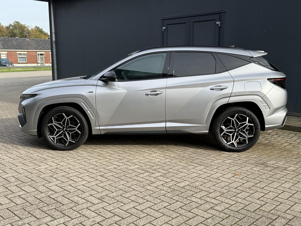 Hyundai TUCSON 1.6 T-GDI HEV 230pk N Line Edition / 1650 KG Trekgewicht / Apple Carplay / Android Auto / Achteruitrijcamera / Stoelverwarming / Navigatie /