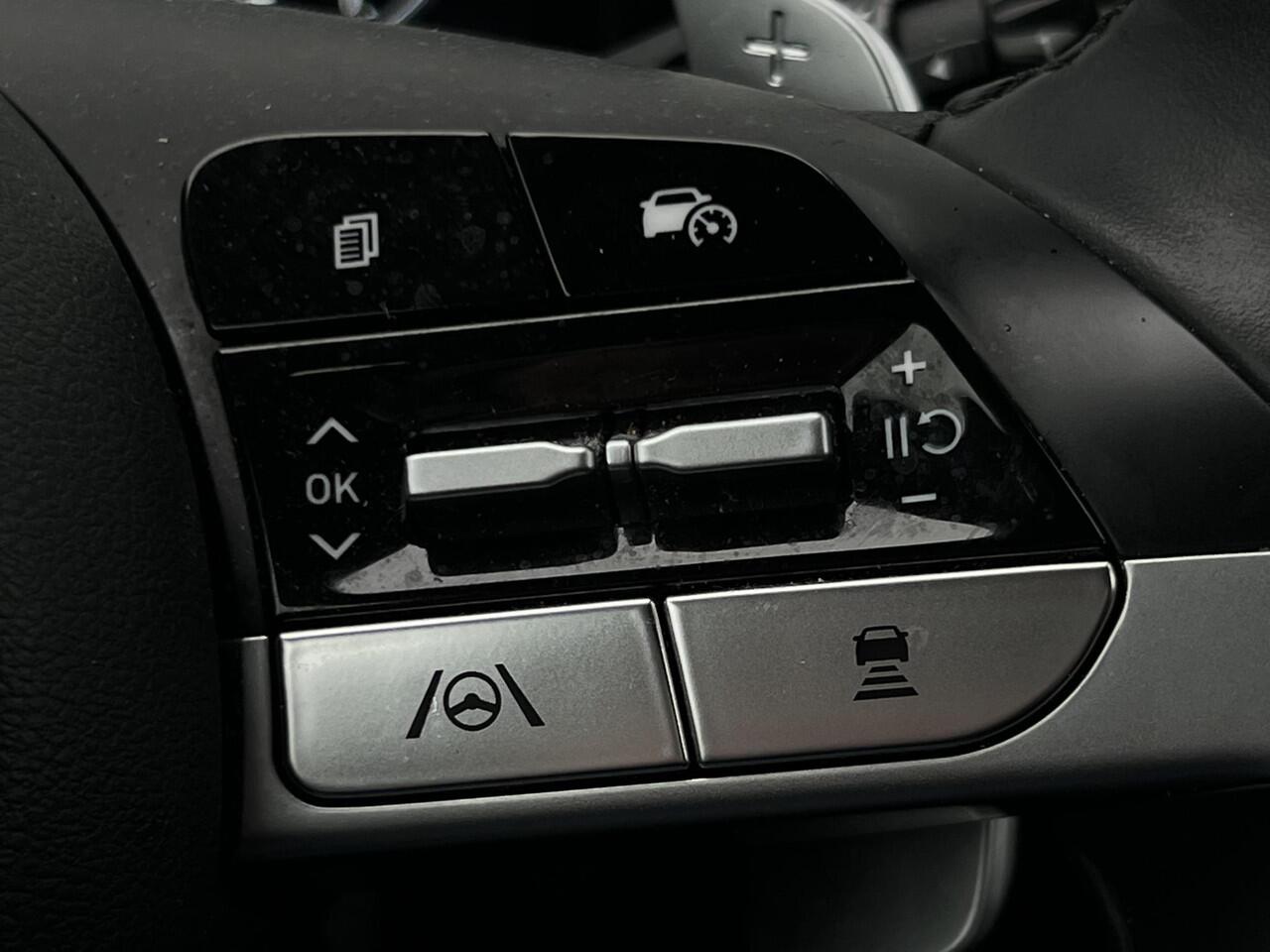 Hyundai TUCSON 1.6 T-GDI HEV Comfort Smart / 1650 kg trekvermogen / Elektrische Achterklep / Navigatie / Stoel & Stuurverwarming / Android Auto & Apple CarPlay / Adaptieve Cruise Control / Achteruitrijcamera / Parkeersensoren Voor + Achter / Passagiersstoel In Hoogte Ve