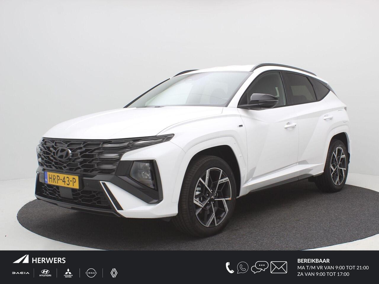Hyundai TUCSON 1.6 T-GDI PHEV N Line Edition / Navigatie / Leer-Alcantara bekleding met rode stiksel / 19" LMV / Stoelverwarming voor / LED verlichting /