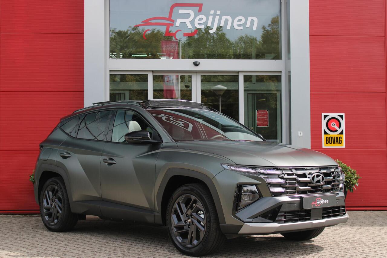 Hyundai TUCSON 1.6 T-GDI PHEV 252PK 20TH ANNIVERSARY+SKY *NIEUW* | PANORAMISCH SCHUIF/KANTELDAK | STUUR / STOELVERWARMING | FULL LED KOPLAMPEN | HALF ALCANTARA / LEDER 20TH ANNIVERSARY DESIGN MET GROENE STIKSELS | NAVIGATIE | ADAPTIVE CRUISE CONTROL | DRAADLOOS APPLE CA