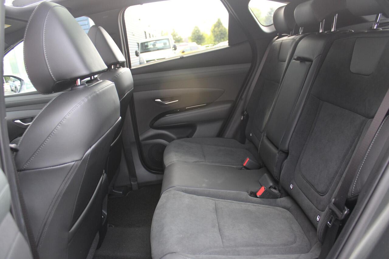 Hyundai TUCSON 1.6 T-GDI PHEV 252PK 20TH ANNIVERSARY+SKY *NIEUW* | PANORAMISCH SCHUIF/KANTELDAK | STUUR / STOELVERWARMING | FULL LED KOPLAMPEN | HALF ALCANTARA / LEDER 20TH ANNIVERSARY DESIGN MET GROENE STIKSELS | NAVIGATIE | ADAPTIVE CRUISE CONTROL | DRAADLOOS APPLE CA