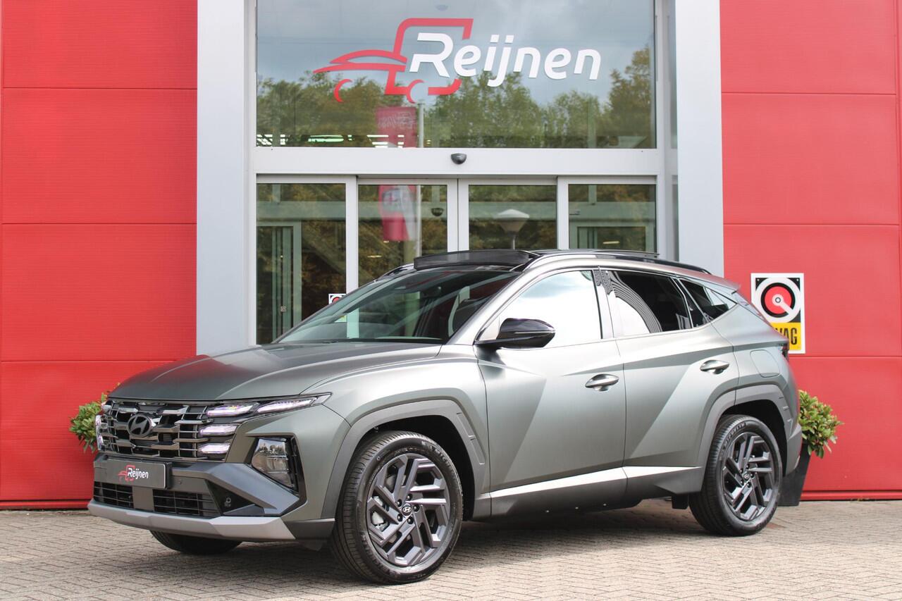 Hyundai TUCSON 1.6 T-GDI PHEV 252PK 20TH ANNIVERSARY+SKY *NIEUW* | PANORAMISCH SCHUIF/KANTELDAK | STUUR / STOELVERWARMING | FULL LED KOPLAMPEN | HALF ALCANTARA / LEDER 20TH ANNIVERSARY DESIGN MET GROENE STIKSELS | NAVIGATIE | ADAPTIVE CRUISE CONTROL | DRAADLOOS APPLE CA