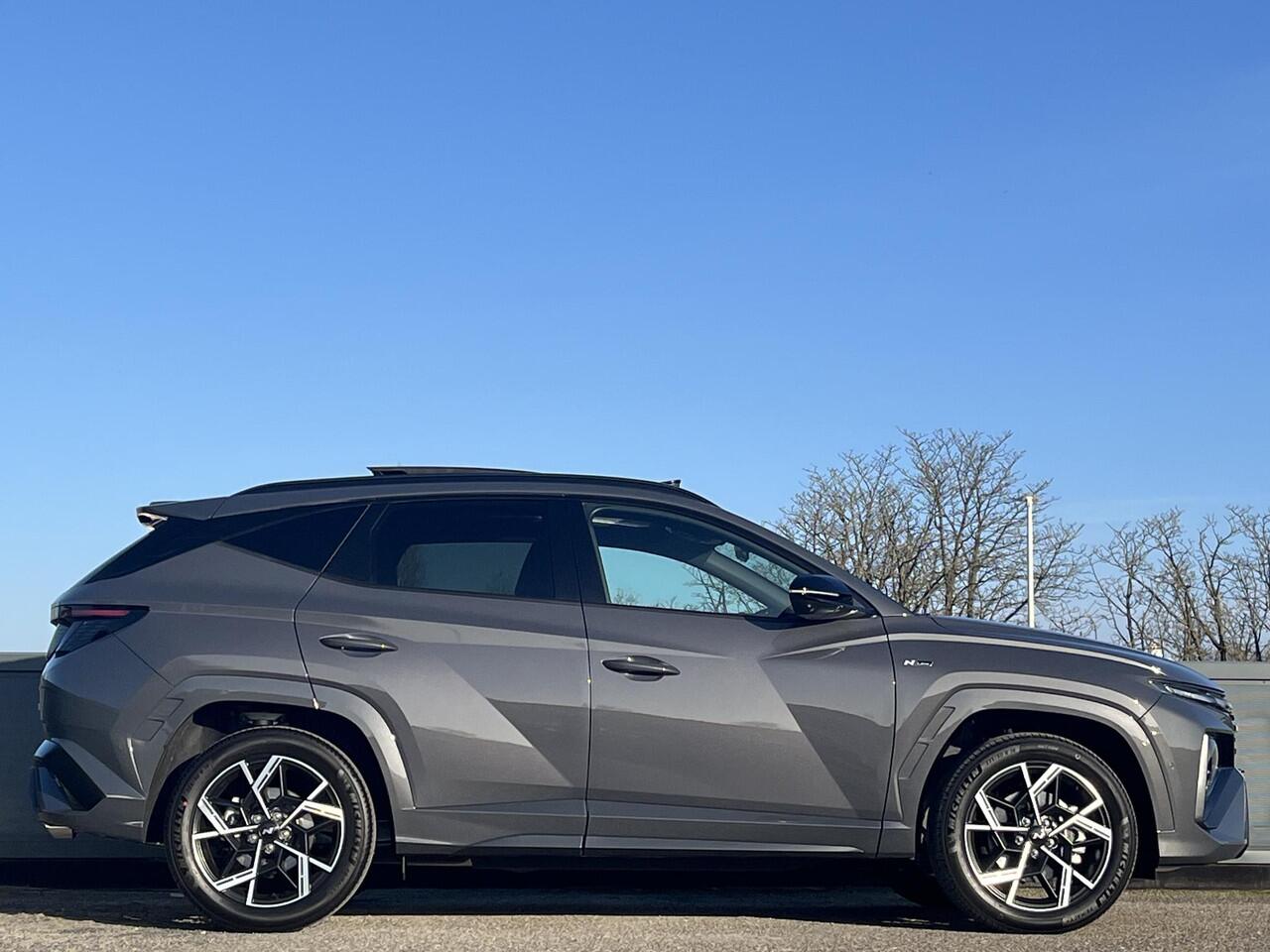 Hyundai TUCSON N Line Sky 1.6 T-GDI HEV 238pk | ¤5.500,- KORTING | MY26 | VERHOOGD VERMOGEN & TREKGEWICHT | SCHUIF/KANTELDAK | 360° CAMERA | ALCANTARA & STOELVERW. & VENTILATIE |