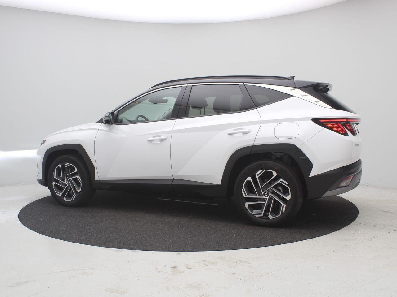 Hyundai TUCSON 1.6 T-GDI PHEV Premium / ¤2.500,- voordeel op de nieuwprijs / Rijklaarprijs / Direct Leverbaar / Full Option / Zwarte Lederen interieur / Two-Tone dak & Lak combinatie /