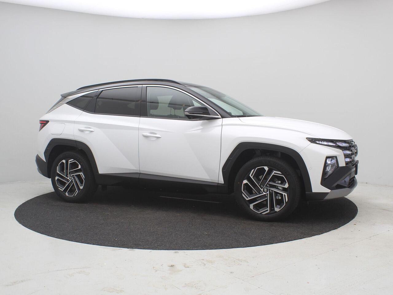 Hyundai TUCSON 1.6 T-GDI PHEV Premium / ¤2.500,- voordeel op de nieuwprijs / Rijklaarprijs / Direct Leverbaar / Full Option / Zwarte Lederen interieur / Two-Tone dak & Lak combinatie /