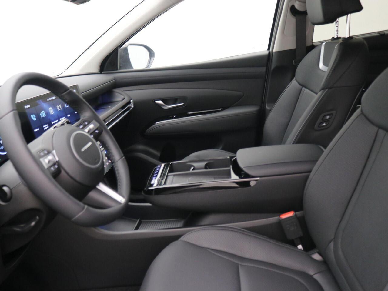 Hyundai TUCSON 1.6 T-GDI PHEV Premium / ¤2.500,- voordeel op de nieuwprijs / Rijklaarprijs / Direct Leverbaar / Full Option / Zwarte Lederen interieur / Two-Tone dak & Lak combinatie /