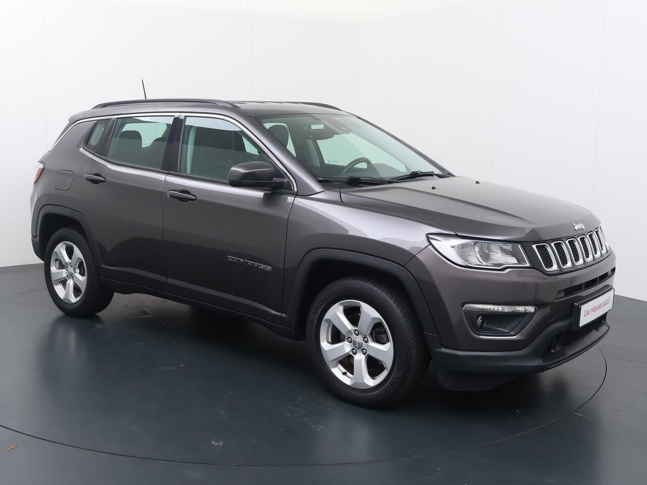 Jeep COMPASS 1.4 MultiAir Longitude | 140pk | Multifunctioneel stuurwiel | Cruise control | Speedlimiter | Spraakbediening | Automatische verlichting | Deurvergrendeling | Climate | Dab+ | Bluetooth | Navigatie | Achteruitrijcamera | Lm17'' |