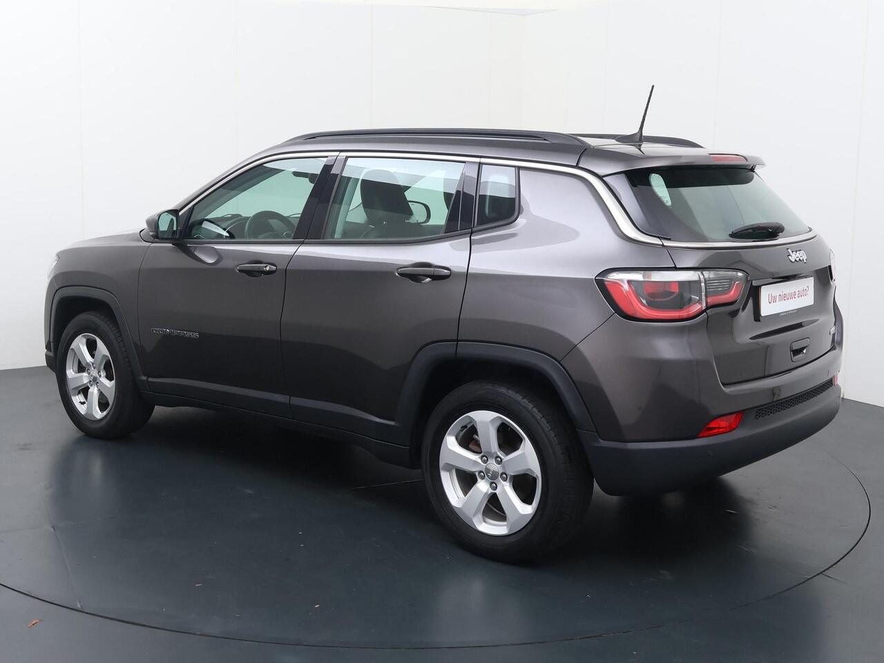 Jeep COMPASS 1.4 MultiAir Longitude | 140pk | Multifunctioneel stuurwiel | Cruise control | Speedlimiter | Spraakbediening | Automatische verlichting | Deurvergrendeling | Climate | Dab+ | Bluetooth | Navigatie | Achteruitrijcamera | Lm17'' |