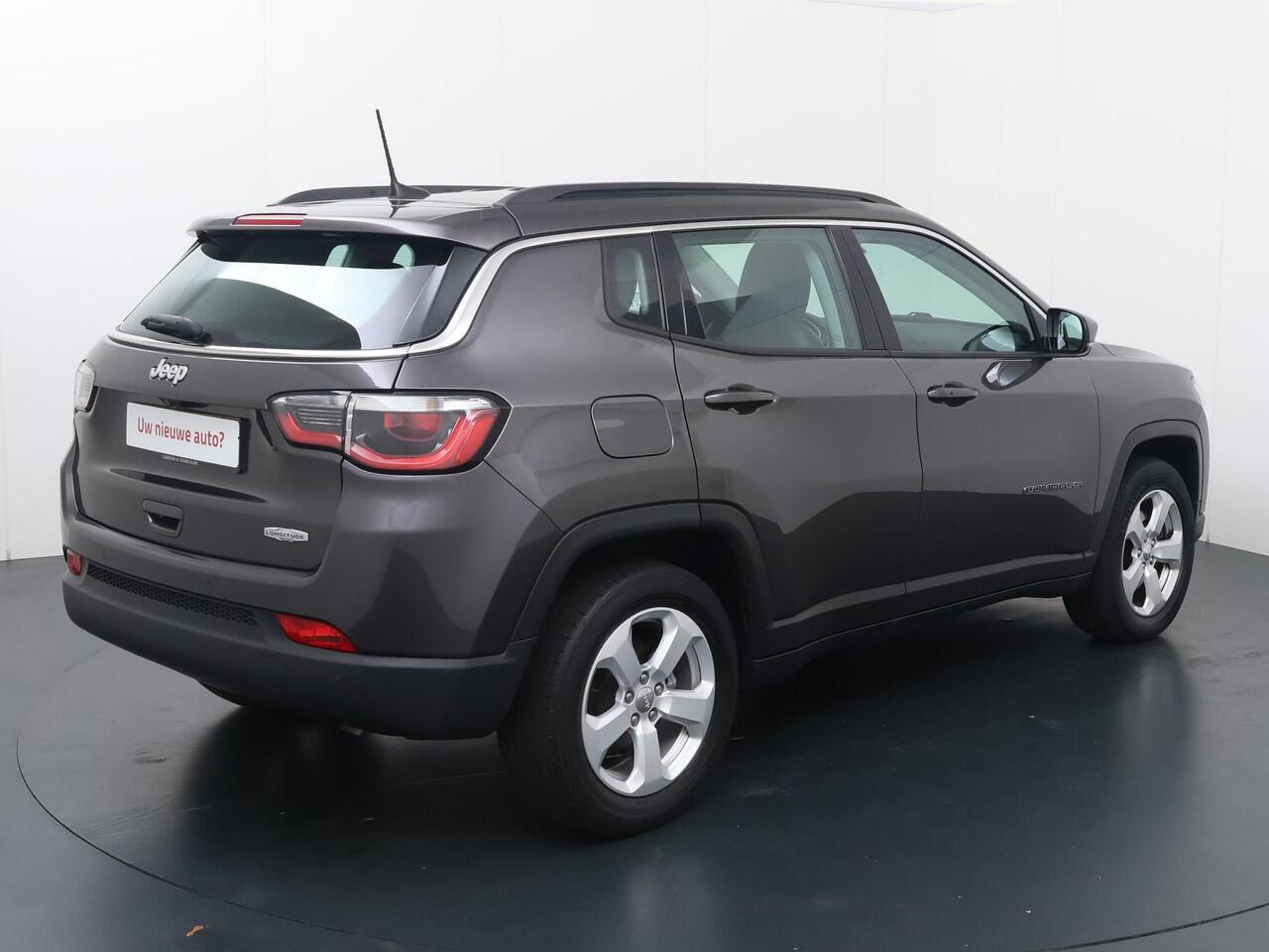 Jeep COMPASS 1.4 MultiAir Longitude | 140pk | Multifunctioneel stuurwiel | Cruise control | Speedlimiter | Spraakbediening | Automatische verlichting | Deurvergrendeling | Climate | Dab+ | Bluetooth | Navigatie | Achteruitrijcamera | Lm17'' |