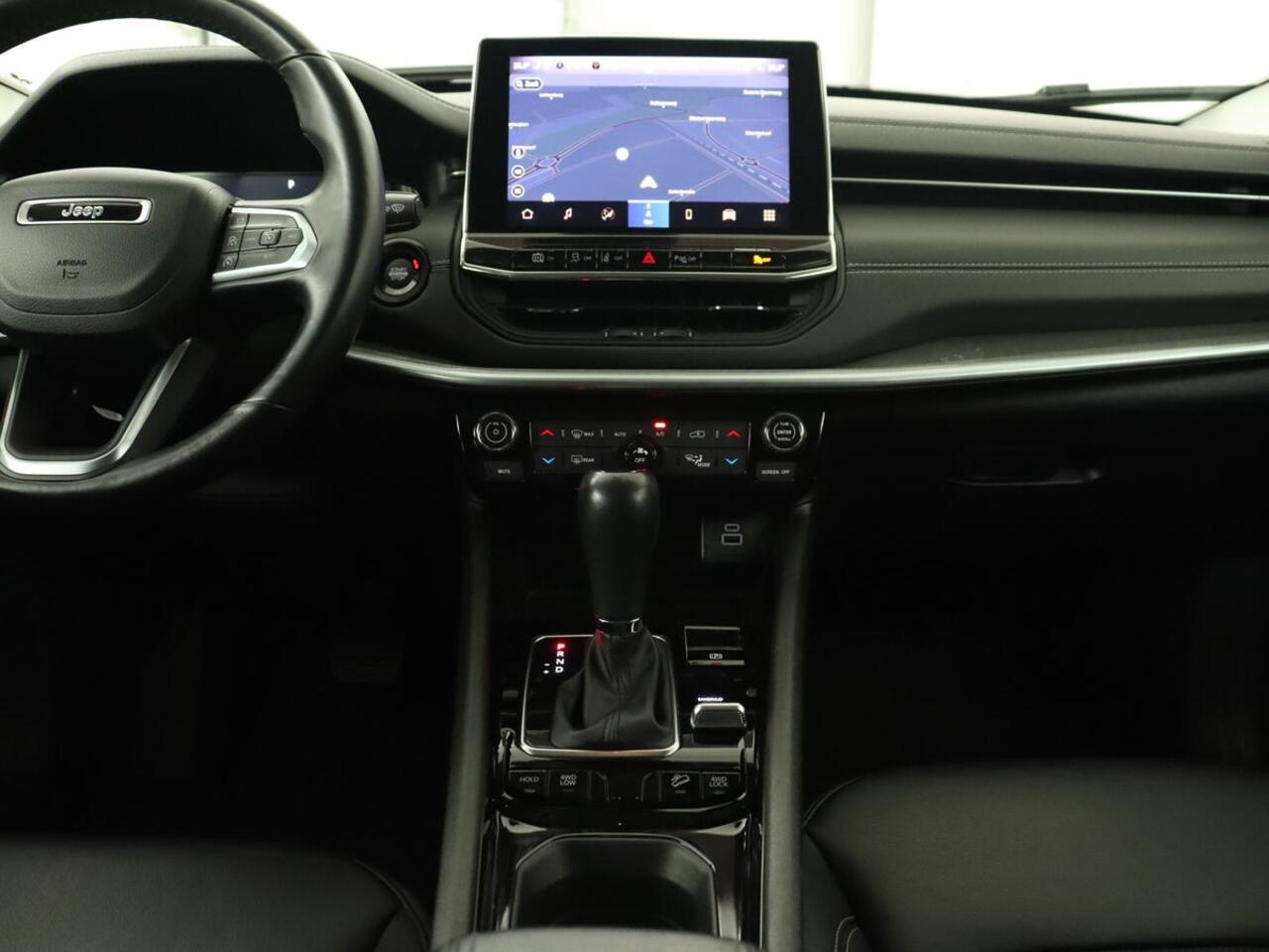 Jeep COMPASS 4xe 240 Plug-in Hybrid Electric S | Leder | Stoel & stuurverwarming | Adaptive cruise | Camera | Carplay | Keyless | Elektrische stoelen | 19'' | Digital Cockpit | Navigatie | PHEV | Plug In